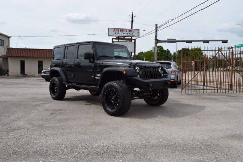 2015 Jeep Wrangler Unlimited for sale at ARI Motors in Houston TX