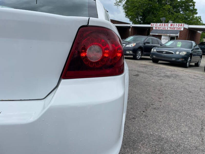 2013 Dodge Avenger for sale at A1 Classic Motor Inc in Fuquay Varina, NC