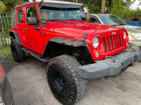 2015 Jeep Wrangler Unlimited for sale at Plus Auto Sales in West Park FL