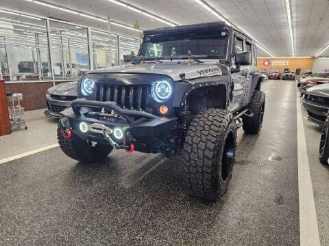 2016 Jeep Wrangler Unlimited for sale at Dixie Motors in Fairfield OH