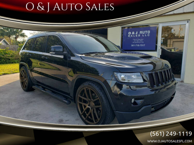 2013 Jeep Grand Cherokee for sale at O & J Auto Sales in Royal Palm Beach FL