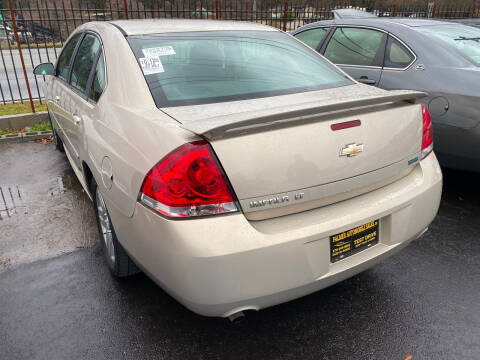 2012 Chevrolet Impala for sale at Palmer Automobile Sales in Decatur GA