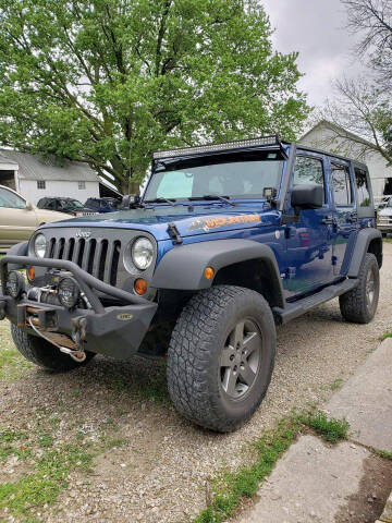 2010 Jeep Wrangler Unlimited for sale at WESTSIDE GARAGE LLC in Keokuk IA