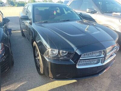 2012 Dodge Charger for sale at CHEAPIE AUTO SALES INC in Metairie LA