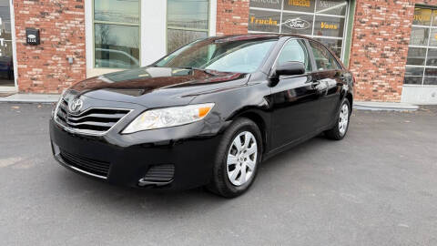 2011 Toyota Camry for sale at Ohio Car Mart in Elyria OH