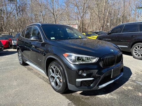 2017 BMW X1 for sale at OMEGA in Avon MA