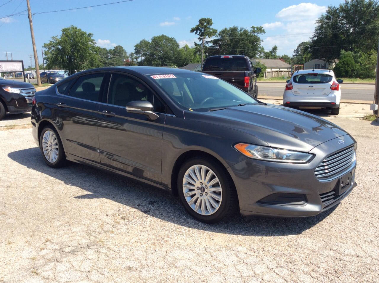 2016 Ford Fusion Hybrid for sale at SPRINGTIME MOTORS in Huntsville, TX