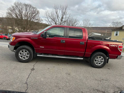 2013 Ford F-150 for sale at George's Used Cars Inc in Orbisonia PA