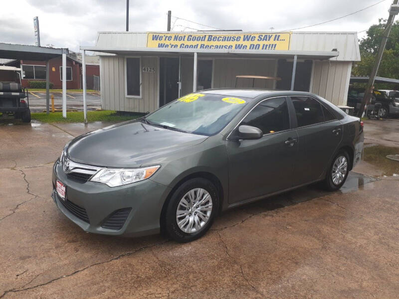 2012 Toyota Camry for sale at Taylor Trading Co in Beaumont TX