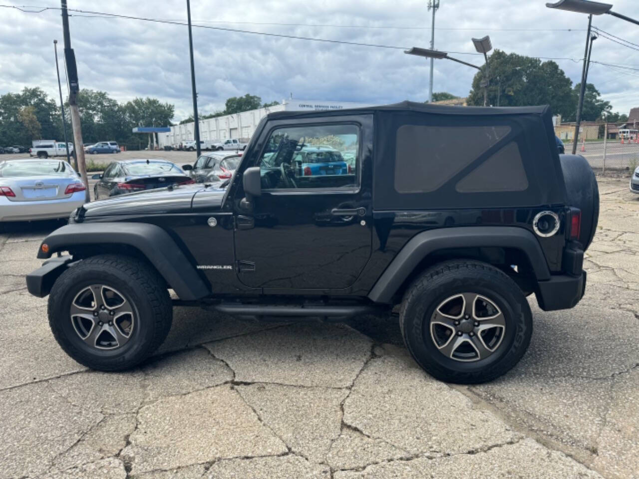 2011 Jeep Wrangler for sale at First Class Auto Mall in Akron, OH