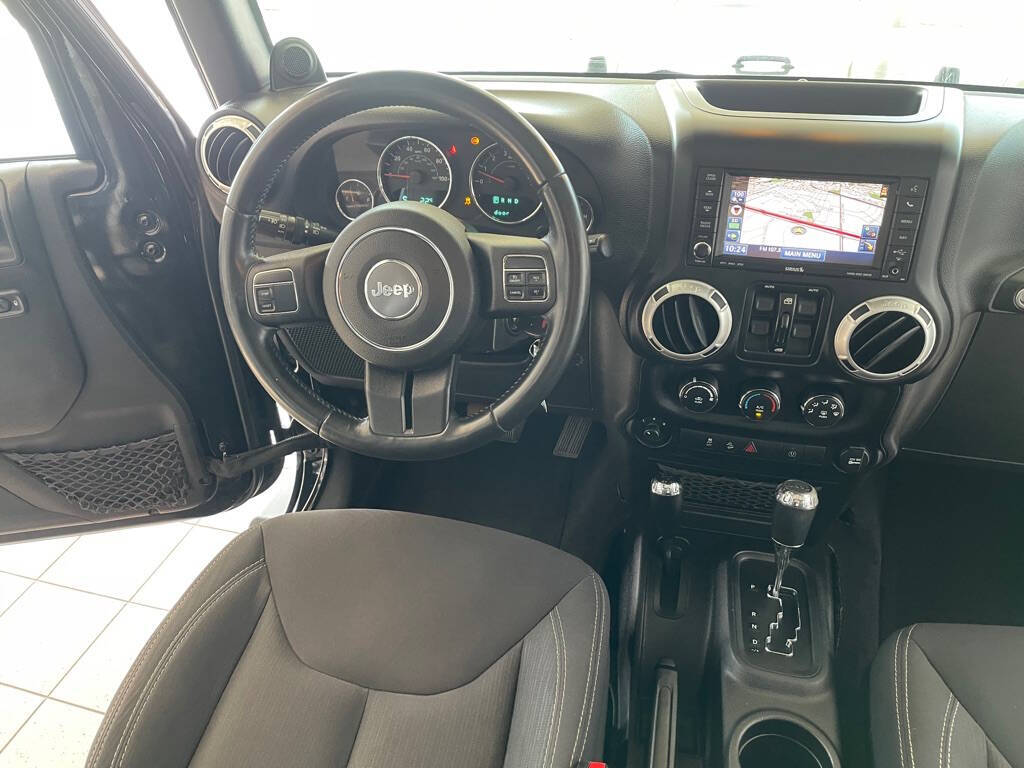 2014 Jeep Wrangler Unlimited for sale at Auto Haus Imports in Grand Prairie, TX