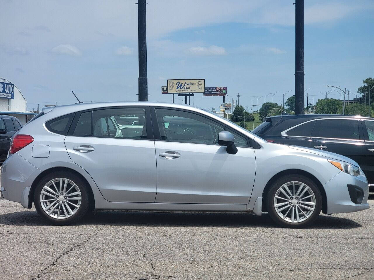 2012 Subaru Impreza for sale at Optimus Auto in Omaha, NE