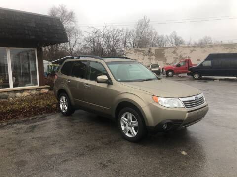 2009 Subaru Forester for sale at BELL AUTO & TRUCK SALES in Fort Wayne IN