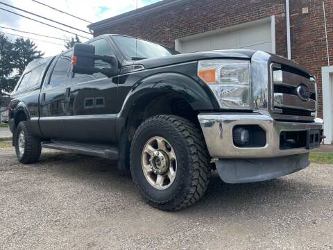 2013 Ford F-250 Super Duty for sale at Jim's Hometown Auto Sales LLC in Byesville OH