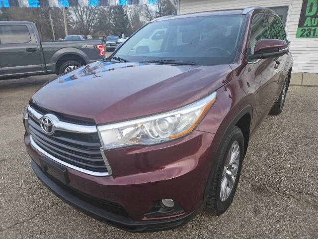 2015 Toyota Highlander for sale at DANGO AUTO SALES in HOWARD CITY, MI