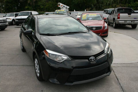 2014 Toyota Corolla for sale at Mike's Trucks & Cars in Port Orange FL