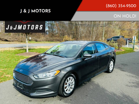 2015 Ford Fusion for sale at J & J MOTORS in New Milford CT