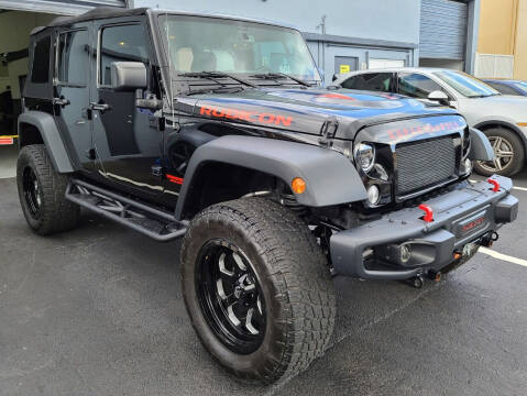 2016 Jeep Wrangler Unlimited for sale at Preowned FL Autos in Pompano Beach FL