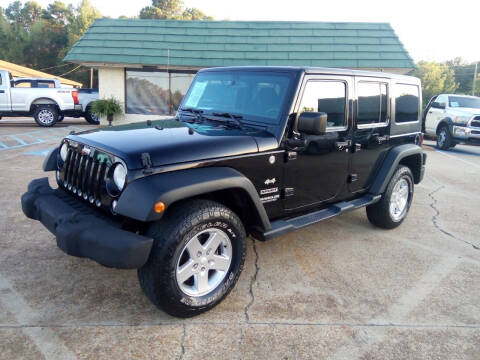 2015 Jeep Wrangler Unlimited for sale at CAPITAL CITY MOTORS in Brandon MS