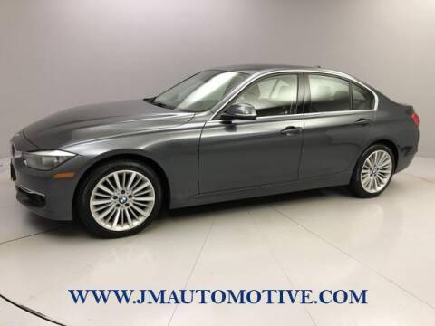 2015 BMW 3 Series for sale at J & M Automotive in Naugatuck CT