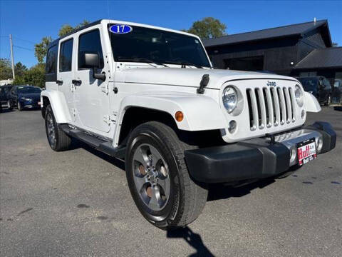 2017 Jeep Wrangler Unlimited for sale at HUFF AUTO GROUP in Jackson MI