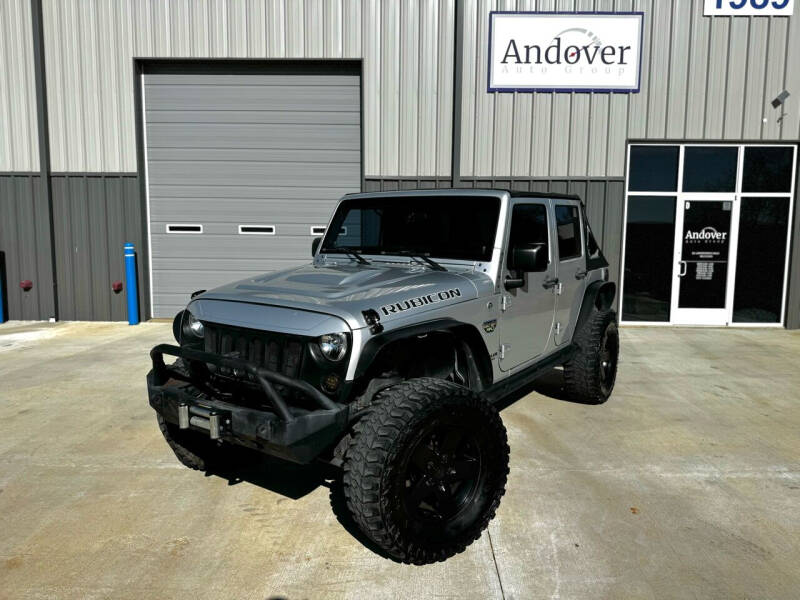 2012 Jeep Wrangler Unlimited for sale at Andover Auto Group, LLC. in Argyle TX