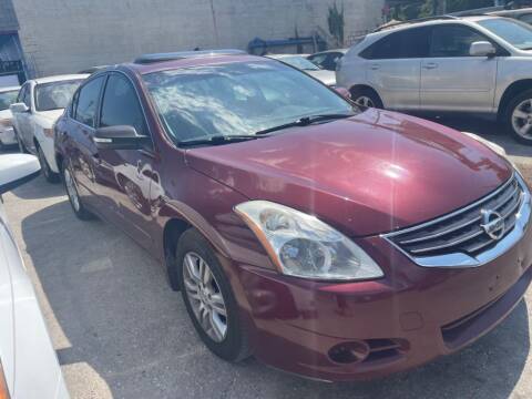 2012 Nissan Altima for sale at STEECO MOTORS in Tampa FL