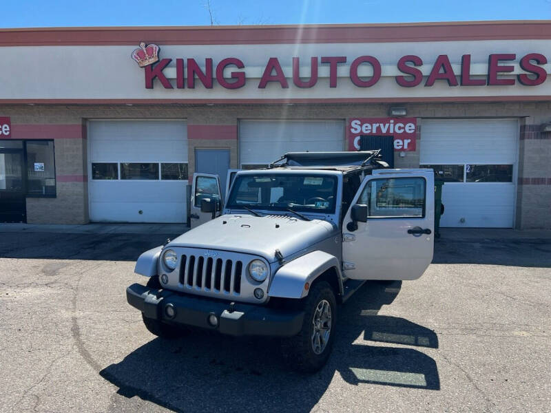 Used 2014 Jeep Wrangler Unlimited Sahara with VIN 1C4BJWEG4EL203963 for sale in Detroit, MI