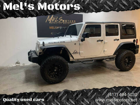 2015 Jeep Wrangler Unlimited for sale at Mel's Motors in Ozark MO