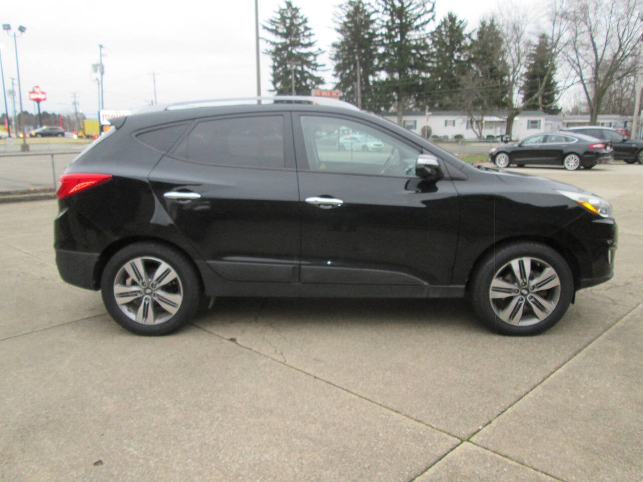 2015 Hyundai TUCSON for sale at AC Motors in North Canton, OH