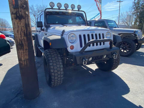 2013 Jeep Wrangler Unlimited for sale at Auto Exchange in The Plains OH