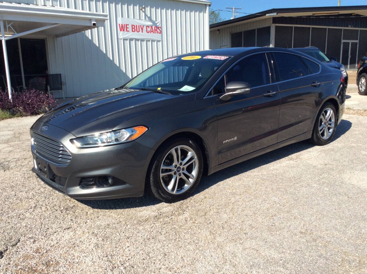 2015 Ford Fusion Hybrid for sale at SPRINGTIME MOTORS in Huntsville, TX