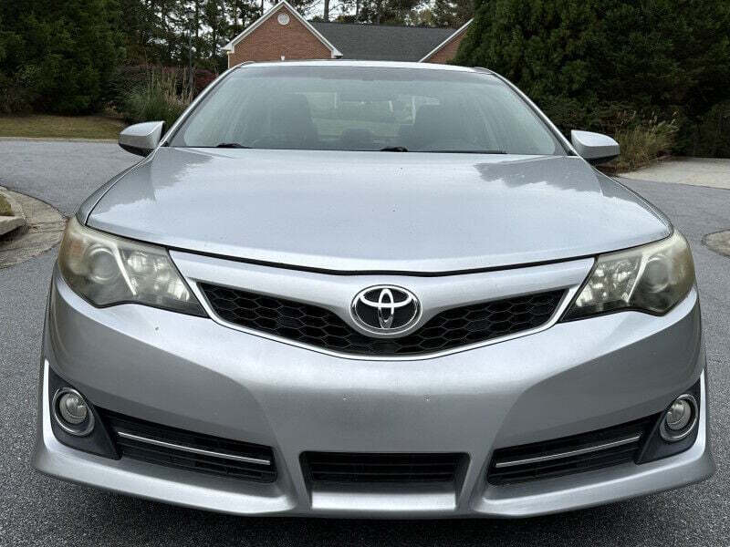 2012 Toyota Camry for sale at SHURE AUTO SALES in Snellville, GA