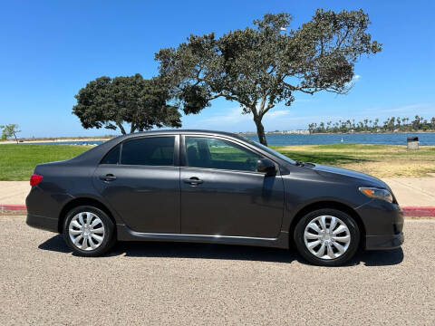 2009 Toyota Corolla for sale at MILLENNIUM CARS in San Diego CA