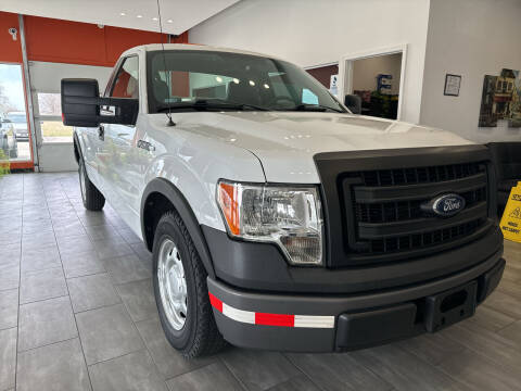 2013 Ford F-150 for sale at Evolution Autos in Whiteland IN
