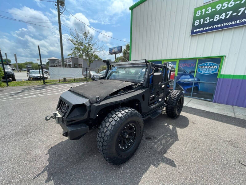 2014 Jeep Wrangler for sale at Bay City Autosales in Tampa FL