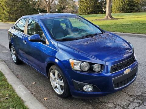 2014 Chevrolet Sonic for sale at AUTO AND PARTS LOCATOR CO. in Carmel IN
