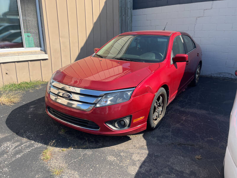 2011 Ford Fusion for sale at Holiday Auto Sales in Grand Rapids MI