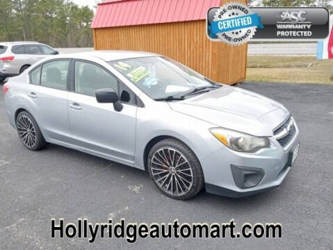 2014 Subaru Impreza for sale at Holly Ridge Auto Mart in Holly Ridge NC