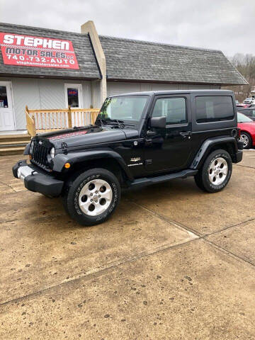 2013 Jeep Wrangler for sale at Stephen Motor Sales LLC in Caldwell OH