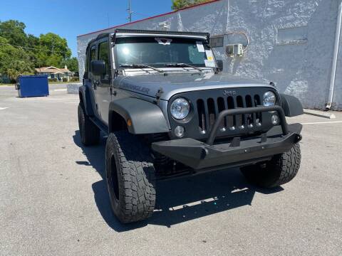 2016 Jeep Wrangler Unlimited for sale at Consumer Auto Credit in Tampa FL
