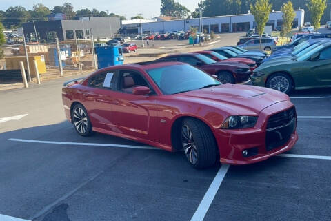 2013 Dodge Charger for sale at Uncle Ray's Auto Gallery / Calavan CDJR in Lithia Springs GA