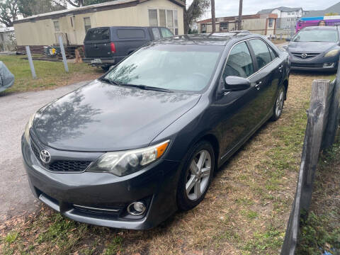 2012 Toyota Camry for sale at Amo's Automotive Services in Tampa FL