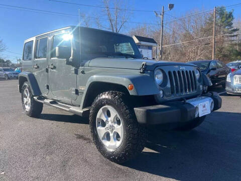 2014 Jeep Wrangler Unlimited for sale at Mega Motors in West Bridgewater MA