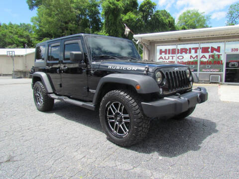 2014 Jeep Wrangler Unlimited for sale at Hibriten Auto Mart in Lenoir NC