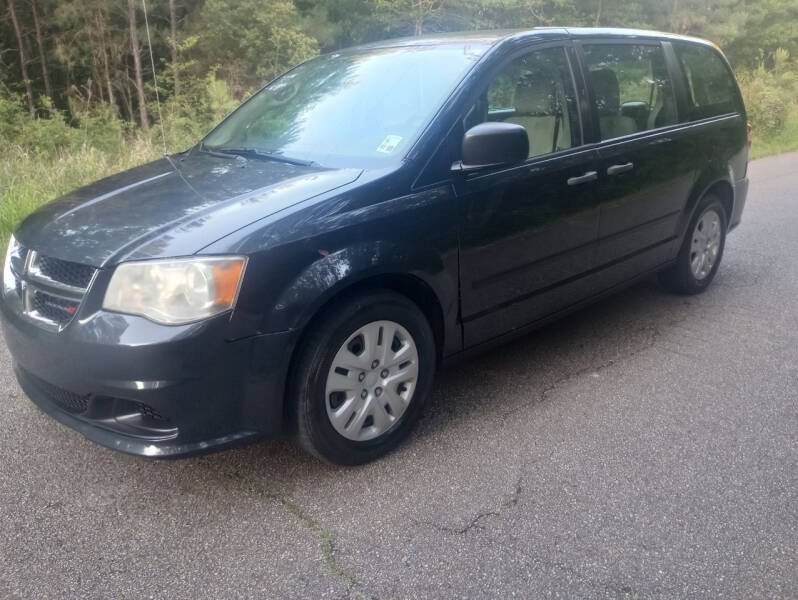 2014 Dodge Grand Caravan for sale at J & J Auto of St Tammany in Slidell LA