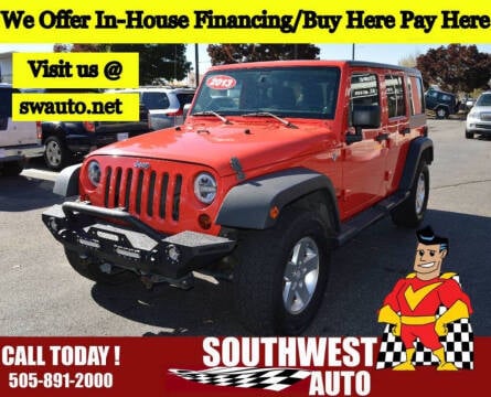 2013 Jeep Wrangler Unlimited for sale at SOUTHWEST AUTO in Albuquerque NM