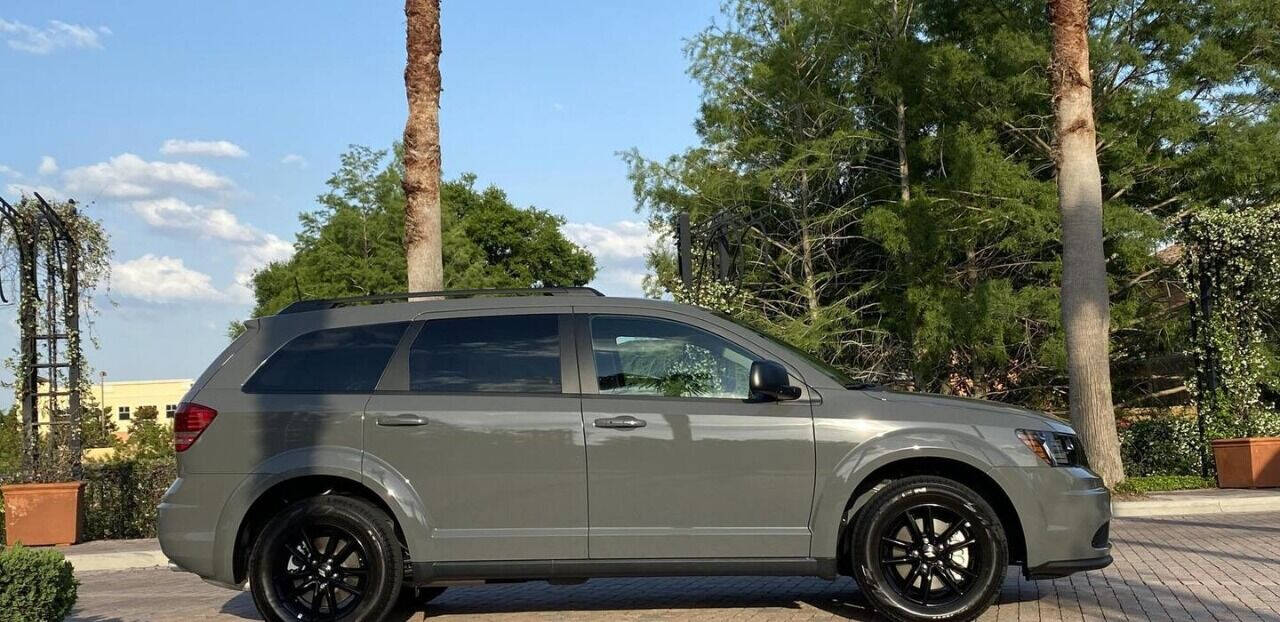 https://cdn05.carsforsale.com/379cf5ef2f30af69159bb3b78f8565c1/1280x960/2020-dodge-journey-se-value-4dr-suv.jpg