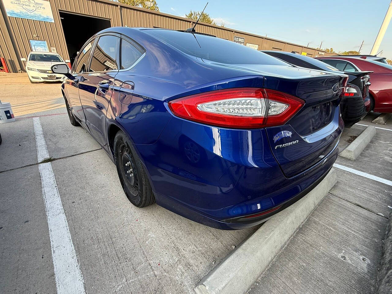 2014 Ford Fusion for sale at Chrome Auto in Houston, TX