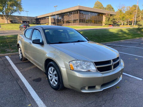 2010 Dodge Avenger for sale at QUEST MOTORS in Centennial CO